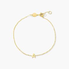 Letters can be so personal. This mini initial chain bracelet is the perfect staple piece to add to your collection. This 14K gold bracelet features a 7 inch chain that secures with a spring clasp. Letter measures 5mm. Dainty Yellow Gold Name Bracelet With Initials, Classic 14k Gold Bracelets With Initials, Minimalist Monogram Bracelet For Everyday, Minimalist Yellow Gold Bracelets With Initials, Minimalist 14k Gold Name Bracelet With Adjustable Chain, Personalized Minimalist 14k Gold Chain Bracelet, Modern Personalized Yellow Gold Chain Bracelet, Minimalist Personalized Yellow Gold Bracelets, Classic Monogram Name Bracelet In Yellow Gold