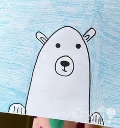 a child's drawing of a polar bear with colored crayons on it