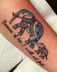 an elephant tattoo on the arm that says, you can't fly with me