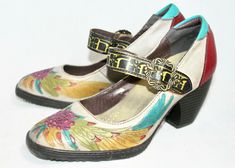 RETRO Mary Jane Pumps in Multicolor Leather Size: Women's 6; EUR 36 Adjustable hook & loop strap with buckle detail Cut-out floral vamp motif 2 1/2" Heel We Love our eBay customers.  We appreciate and value your business.  We ship everyday except Sunday and holidays We are smoke and pet free We are happy to combine shipping Please visit our eBay store for more great items! Mary Jane Shoes Heels, Zapatos Mary Jane, Punk Shoes, London Shoes, Fashion Footwear, White Pumps, Fly London, Unique Shoes, Shoe Art