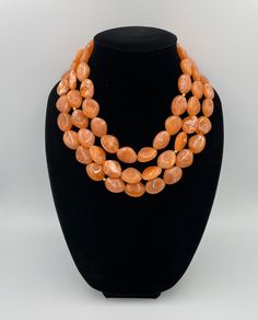 Introducing our beautiful orange necklace, the perfect accessory to brighten up any outfit, creating a bold and eye-catching look. This necklace is designed to sit perfectly around your neck, enhancing your natural beauty and adding a pop of color to your look. Whether you're wearing it with a little black dress or a simple white tee, this orange necklace is sure to make a statement. This beautiful necklace is completely handmade with high quality.  - Necklace length is 17" shortest strand plus Acrylic Clouds, Short Layer, Orange Statement Necklace, Long Layer, Salmon Orange, Necklace Orange, Autumn Necklace, Orange Necklace, Necklace Big