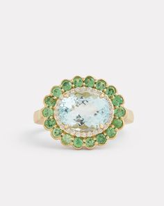 18K Yellow Gold Tsavorite and Diamond Edged Aquamarine Oval Ring, .14 TCWOrnament is 3/4 Inch x 1/2 Inch Style# YRSSOATW Luxury Tsavorite Diamond Ring, Luxury Tsavorite Birthstone Ring For Engagement, Gem Stones Aesthetic, Aquamarine Oval Ring, Dinner Rings, Rustic Engagement Rings, Aquamarine Ring Vintage, Big Engagement Rings, Hand Rings