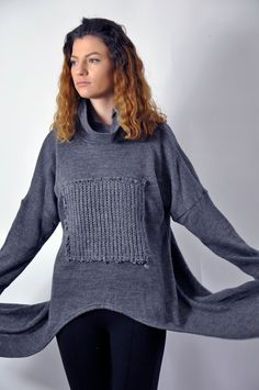 "Winter Wool Sweater, Dark Gray Sweater, Women Sweater, Warm and cozy sweater. Your winter days will be made easier with this practical loose sweater. With it you will feel very free. It is easy to combine. It is made of woolen knitting with an applique of woolen knitting. Unique and comfortable. ✂ Fabric: 100% wool Care - Hand wash , 30 Degree ◾ The style I used was originally designed and professionally constructed by me. Each item of my shop is specially packaged with a lot of concern! Handma Gray Merino Wool Top For Fall, Funnel Neck Sweater For Layering, Winter Cotton Knit Sweater, Cotton Knit Sweater For Winter, Cozy Relaxed Fit Sweater For Cold Weather, Relaxed Fit Sweater For Cold Weather, Winter Merino Wool Tops In Relaxed Fit, Winter Merino Wool Relaxed Fit Tops, Knit Sweater With Funnel Neck