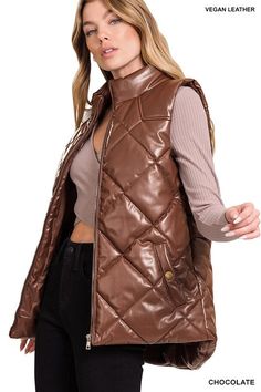 The Vegan Leather Puffer Vest is a fashion-forward choice that combines style and ethics. Crafted from cruelty-free vegan leather, it offers a chic and edgy look without harming animals. With its puffer design, this vest provides warmth and insulation, making it a versatile addition to your fall and winter wardrobe, perfect for layering over sweaters or long-sleeved tops for a trendy and cozy outfit. Style: Casual Print / Pattern: Quilted Silhouette: Vest Fit: Regular Embellishment: Side Pockets Leather Puffer Vest, Leather Puffer, Quilted Puffer Vest, Outerwear Vest, Cozy Outfit, Edgy Look, Total Body, Puffer Vest, Sheer Fabrics