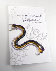 a card with an image of a yellow and black snake on it's side