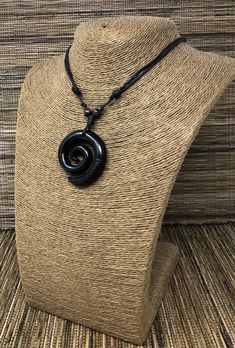 "*Beautiful Spiral Necklace *The Spiral signifies a New Beginning, Spirituality, Peace and Tranquility *Adjustable Black Cord - Fits Most Size - From 16\" Inches up to to 30\" Inches. Pull the knots and the cord to adjust the lenght *Pendant Dimensions: Approximately 2\" Inches x 2\" inches This beautiful necklace is simply stunning. Our commitment to excellent quality ensures each piece is skillfully inspected. Order this today or browse our incredible selection of jewelry. FAST SHIPPING! *Firs Adjustable Symbolic Spiral Jewelry, Symbolic Adjustable Spiral Jewelry, Spiral Adjustable Necklace As Gift, Adjustable Spiral Necklace For Gifts, Adjustable Spiral Necklace As Gift, Adjustable Spiral Necklace For Gift, Handmade Adjustable Swirl Jewelry, Handmade Adjustable Spiral Necklace, Spiral Black Necklace As A Gift