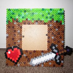 a photo frame made out of plastic beads