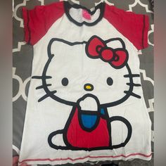 Size Large, But Seems Like Junior Large. Brand New Red Cartoon Print Top For Summer, Red Cartoon Print Tops For Summer, Red Cartoon Print Top For Spring, Playful Red Short Sleeve Shirt, Fun Red Shirt With Cartoon Print, Fun Red Spring Shirt, Red Hello Kitty Print Crew Neck Top, Casual Red Hello Kitty Top, Red Crew Neck Top With Hello Kitty Print