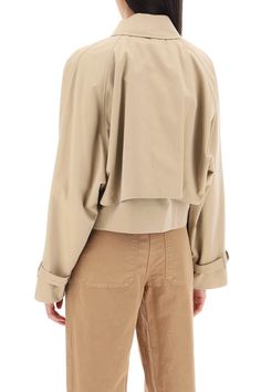 This Burberry cropped jacket is cut from lightweight cotton gabardine and boasts a double layer design, composed of a sleeveless base and a non-removable long-sleeved overlay. It closes with a double-slider zip beneath a snap placket and features a shirt collar with throat latch, side welt pockets and two inside pockets. The dolman sleeves bear a raglan cut on the back and belted cuffs. Burberry Check cotton lining. The model is 177 cm tall and wears a size UK 6. Size Info UK Color Detail Beige Layer Design, Cropped Jacket, Jacket Sale, Roberto Cavalli, Layers Design, Crop Jacket, Shirt Collar, Burberry Bag, Dolman Sleeve