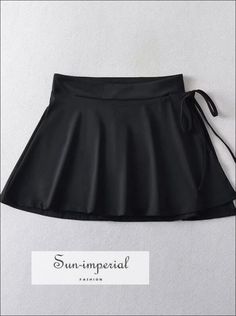 Material: Polyester Material: Spandex Style: High Street Elasticity: High Stretch Origin: Mainland China Season: Summer Fabric Type: JERSEY Waistline: Empire Pattern Type: Solid Fit Type: Slim Fit Silhouette: A-LINE Dresses Length: Above Knee, Mini Decoration: Lace-up is_customized: No Gender: WOMEN PolyesterSize Table S : Waist 62-72m(24.4"-28.3") Hip 72-85cm(28.3"-33.5") Length 35cm(13.8") M : Waist 66-76cm(26"-29.9") Hip 76-90cm(29.9"-35.4") Length 36cm(14.2")L : Waist 70-80cm(27.6"-31.5") Hi High Waist Solid Color Tennis Skirt For Summer, High Waist Solid Color Summer Tennis Skirt, High Waist Elastane Swim Skirt For Summer, Solid Color Skirted Tennis Skirt For Summer, Black Summer Mini Skort, Summer Solid Color Tennis Skirt, Fitted Beach Skirt In Solid Color, Solid Color Stretch Skirted Swimwear, High Waist Elastane Mini Skirt For Summer