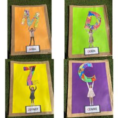 four children's art projects displayed on the grass