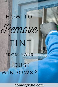 a person cleaning windows with the words how to remove tint from your house windows?