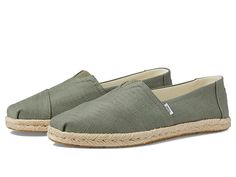 TOMS Alpargata Rope - Women's Shoes : Vetiver Grey : For information on how TOMS contributes to the community, please visit the Bring on that boho-chic vibe to your basic casual look wearing the TOMS Alpargata Rope Loafers. Soft printed canvas upper. Breathable fabric lining. Canvas footbed with rope wrap midsole. Removable OrthoLite Eco LT Hybrid insole for elevated cushioning and lightweight performance. Slip-on style for easy on/off. Classic round toe silhouette. Man-made outsole. Imported. M Casual Fabric Espadrilles For Spring, Casual Spring Fabric Espadrilles, Comfortable Cotton Espadrilles For Spring, Casual Cotton Espadrilles For Spring, Beige Woven Espadrilles In Casual Style, Casual Beige Woven Espadrilles, Casual Green Espadrilles For Spring, Comfortable Low-top Espadrilles With Textured Sole, Casual Woven Slip-on Espadrilles