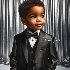 a young boy dressed in a tuxedo and bow tie