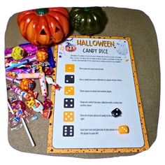 a halloween candy game is on the table