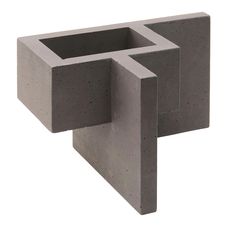 an object made out of concrete blocks on a white background