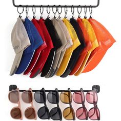 several pairs of sunglasses hanging on a rack