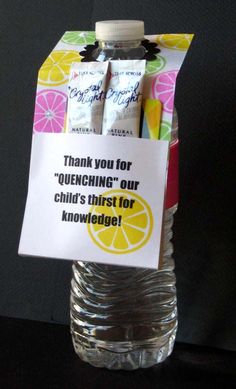 a water bottle with a note attached to it that says thank you for quenching our child's thirst for knowledge