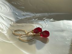 This red ruby earrings is wire wrapped with 14k gold filled wire. Ruby is a July birthstone. 14k Gold Filled Teardrop Earrings For Gift, 14k Gold Filled Birthstone Teardrop Earrings, Red 14k Gold Filled Earrings For Gift, Dainty Red Jewelry With Ear Wire, Dainty Red 14k Gold Earrings, Hypoallergenic 14k Gold Filled Teardrop Earrings For Gift, Red 14k Gold Filled Drop Earrings, Elegant Red 14k Gold-filled Earrings, Elegant Red 14k Gold Filled Earrings