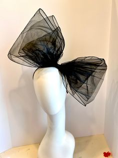 "Black bow Fascinator - Big Bow -Wedding Headpiece -chiffon bow- Kentucky Derby- Big bow Headband Hi,  This triple bow headband has a handmade 9\" wide chiffon with black  edge.  It's sprayed with stiffener to hold its shape. Colors: Black ivory  white pink hot pink  It's all placed on a 1/8\" covered headband.  This covered headband fits any head size and very comfortable. Plus no headaches! Pick a headband that matches Your hair color so it blends in. Light weight! For all ages...13  to 93!  I am based in the NYC metropolitan area where I started with a shop in Soho.  I make quality accessories using the best fabrics and trims. I love to incorporate vintage items in my creations.   ------------------------------------------------- I ship US Postal Service.     USA DOMESTIC CHOICES (From Bow Fascinator, Big Bow Headband, Princess Gown, Derby Party, Black Headband, Wedding Bows, Large Bow, Big Bow, Wedding Headpiece