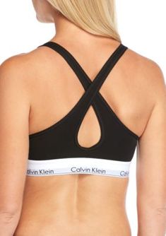 Classic cotton lines this must-have bralette featuring comfortable padding and a stylish Calvin Klein band. | Calvin Klein Women's Modern Cotton Lined Bralette, Black, Large Black Cotton Sports Bra For Summer, Cotton Workout Bra, Black Stretch Cotton Sports Bra, Bra Friendly Black Cotton Crop Top, Black Cotton Crop Top Bra Friendly, Black Cotton Bra Friendly Crop Top, Calvin Klein Medium Support Sports Bra For Workout, Spring Stretch Calvin Klein Bra, Calvin Klein Seamless Sports Bra With Medium Support