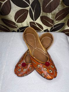 Traditional, handmade Punjabi jutti for women. Length: 9.75in/24.7cm  Width: 3in/7.62cm Estimated size: US Women's 5.5 UK Women's 3.5 Festive Flats For Transitional Season, Handwork Flats For Summer, Festive Flats For Festivals, Traditional Handmade Flats, Handmade Festive Slip-on Flats, Festive Handmade Slip-on Flats, Bohemian Flats For Festive Season, Transitional Season Cutdana Flats, Traditional Handmade Flats For Festival