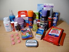 the contents of a personal care kit laid out on a table