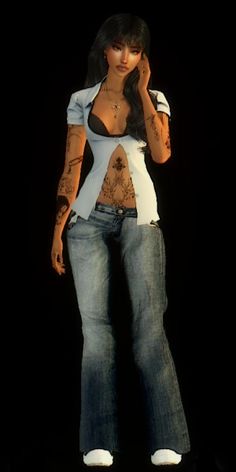 a woman with tattoos on her body and jeans standing in front of a black background