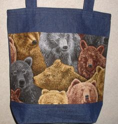 This NEW HANDMADE bag features a cute bears theme on the front pocket. The bag body measures approximately 16x16 inches by 4 inches deep. The straps are approximately 29 inches in length. The lined front bears print pocket is approximately 16 x 9 inches and has a velcro closure. This is a QUALITY handmade tote, made by us in our smoke free home in the Arkansas Ozarks. We use heavy denim and quality pocket materials to make this tote. We prewash the denim in non-perfumed detergent to reduce shrin Casual Travel Bag With Bear Design, Brown Bear Design Bags For Everyday Use, Brown Bags With Bear Design For Everyday Use, Branson Mo, Bear Theme, Denim Tote Bags, Handmade Tote, Denim Tote, Wildlife Nature