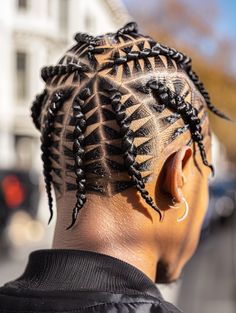 Spiderweb cornrows are a true work of art, featuring intricate braiding that resembles the patterns of a spider’s web. This style is especially suitable for heart and diamond face shapes and makes a statement at artistic showcases or fashion events. Spider Braids Men, Spider Web Braids, Spider Web Braids Men, Heart Cornrows Men, Star Cornrows Braids Men, Cornrows Men, Men’s Braids Top, Cornrows With Beads, Cornrow Styles For Men