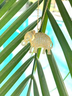 ✦DESCRIPTION ✦ A gift she'll never forget, the Diamond Elephant Pendant Necklace is decorated with simulated diamonds. Its raised trunk is said to symbolize good luck. Fashioned in 14k yellow gold plating/ white rhodium of this necklace comes suspended on your choice of a 16" or 17" long matching chain for no additional charge. Pendant Dimensions: Width 3 cm                                        Length 2 cm MADE WITH LOVE-- Celebrate the special women in your life! This unique and heartfelt fas Elephant Necklace Gold, Lucky Charm Necklace, Elephant Pendant Necklace, Silver Elephant, Gold Elephant, Silver Elephants, Elephant Necklace, Elephant Pendant, Necklace Sterling Silver