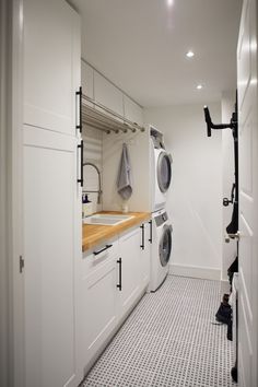 a washer and dryer in a small room