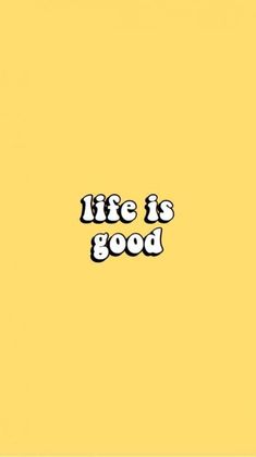 the words life is good on a yellow background