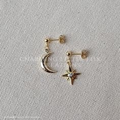 I use stainless steel posts and chain, and gold plated moon and star charms. The long style earring measures about 2 inches long. The short style measures about 1 inch long. Please be aware that monitor settings can differ, and colors may vary slightly! Celestial Accessories, Gold Moon Earrings, Gold Star Earrings, Celestial Earrings, Pretty Jewelry Necklaces, Moon And Star Earrings, Asymmetrical Earrings, Jewelry Tattoo, Gold Moon