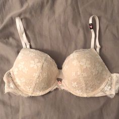 White Lace Dream Angels Push Up Bra 36b. Adjustable Straps. Hook Closure In Back. Brand New With Tags. Never Worn. White Feminine Bra With Lace Trim, Fitted White Lace Bra, White Delicate Lace Fitted Bra, Victoria's Secret White Padded Bra, White Padded Bra For Spring, Spring White Padded Bra, White Feminine Bra With Lined Body, Feminine White Bra With Lined Body, White Lace Push-up Bra