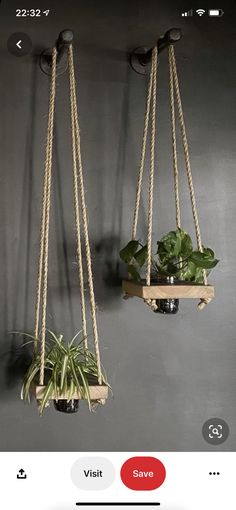 two hanging planters with plants in them