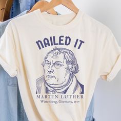 This history teacher shirt makes a totally unique history gift for history teachers, historians, and history buffs alike! Grab this tee today while it's on sale! Delivery Times: ◦ Production: 1 business day (avg.) ◦ Shipping: 3 business days (avg.) Unisex Fit: ◦ Extra soft, preshrunk unisex t-shirt ◦ Women: Semi-fitted, laidback, rollable, & tuckable ◦ Men: Fitted on upper body & loose around the belly ☞ Size up for a looser fit Materials: ◦ Solid Colors: 100% soft ring spun cotton ◦ Heather Col Fun Teacher Tshirts, Funny History Shirts, History Teacher Aesthetic Outfits, History Tshirts, History Teacher Shirt, Shirt Outfit Ideas, Protestant Reformation, History Teacher, History Teachers