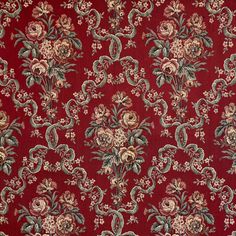 a red and green floral pattern on fabric