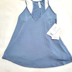 Super Soft And Light Athleta Nighttime Bliss Sleep Cami. Xs New, Pet And Smoke Free Home. Blueish Gray Color. Blue Stretch Tank Top For Loungewear, Blue Tank Top For Yoga In Summer, Light Blue Athleisure Top For Loungewear, Light Blue Yoga Activewear For Summer, Comfortable Blue Tops For Relaxation, Racerback Tops For Loungewear, Sporty Light Blue Tops For Loungewear, Athleisure Racerback Top For Loungewear, Gray Sleeveless Activewear For Loungewear