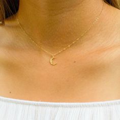 The moon is widely believed to be a feminine symbol, bringing immortality and eternity. Perfect gift idea for girlfriends, sisters or best friends! Choose between several lengths and we will make this necklace with care.…………………………………. Details: Size Small Moon: measures 10 x 8.5mm, Large Moon: 14.5mm x 12mm Pendant is Gold or Silver Plated Chain is 14k Gold Filled or Sterling Silver Average necklace length is 18" About Your Jewelry If you are not wearing your jewelry it is best to store it in a c Elegant Moon Shape Clavicle Chain Necklace, Crescent Moon Phase Necklace For Wedding, Elegant Half Moon Necklace, Celestial Moon Charm Jewelry As Gift For Her, Adjustable Moon Phase Necklace, Adjustable Moon Clavicle Chain Jewelry, Dainty Clavicle Crescent Chain Jewelry, Adjustable Moon Shaped Clavicle Chain Jewelry, Adjustable Moon-shaped Clavicle Chain Jewelry