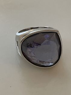 This is a gorgeous large chunky modernist statement ring from Paris. Free form amethyst crystal is faceted and set into a sleek and substantial setting. Sterling silver, marked SS.  Magnificent. Size 7.25. Normal wear. Shipped with care. Modern Crystal Ring With Large Stone, Modern Amethyst Ring As Gift, Modern Silver Amethyst Gemstone Ring, Amethyst Crystal, Purple Amethyst, Vintage French, Statement Ring, Rings Statement, French Vintage