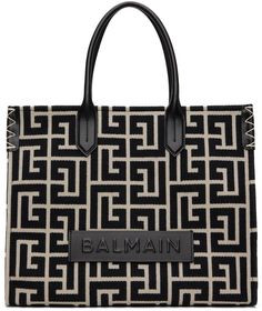 Cotton-blend twill tote in black and white. · Buffed calfskin trim throughout · Jacquard logo pattern throughout · Rolled fixed carry handles · Logo patch at face · Press-stud fastening at sides · Bumper pads at base · Lanyard-clasp closure · Patch pocket at interior · Detachable press-stud pouch · Canvas lining · Logo-engraved gold-tone hardware · H13 x W16.5 x D6.5 Supplier color: Ivoire/Noir Monogram Tote, Logo Pattern, Black And White Colour, Press Studs, Womens Tote Bags, Canvas Tote, Patch Logo, Patch Pocket, White Color