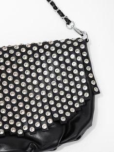 This Aria Crystal Studded Messenger Bag offers both style and convenience with its dual strap design. The crystal studs add a touch of elegance, while the practicality of two straps allows for versatile wear, providing added comfort and functionality. Enjoy the perfect combination of fashion and practicality with this messenger bag. SizeLENGTH: 8.5"HEIGHT: 8.5" WIDTH:2.5" QualityMade with premium materials for quality and endurance Imported BAG12021BK Chic Studded Shoulder Bag, Chic Studded Shoulder Bag For Party, Chic Party Shoulder Bag With Studs, Studded Evening Shoulder Bag, Evening Shoulder Bag With Studs, Studded Leather Party Bag, Leather Party Bag With Studs, Everyday Studded Bags, Studded Evening Bag