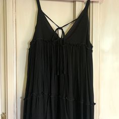 Brand New Never Worn Sexy Black Summer Dress, Spaghetti Straps, Ties In Back. Black Mini Dress With Straps For Vacation, Black Flirty Tank Top For Summer, Flirty Black Tank Top For Summer, Flirty Black Summer Tank Top, Black Camisole Mini Dress For Beach, Black Camisole Mini Dress For The Beach, Black Strap Beach Dress, Black Mini Dress With Adjustable Straps For Vacation, Black Camisole With Straps For Summer