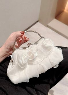 Our Organza 3D Flowers Satin Evening Bag makes for a stunning addition to any formal ensemble. Crafted from luxurious white satin and boasting beautiful 3D organza flowers, this evening bag is the perfect accessory for a sophisticated evening look. Evening Look, Organza Flowers, 3d Flowers, White Satin, White Bag, Evening Bags, Bag Making, Satin, Flowers