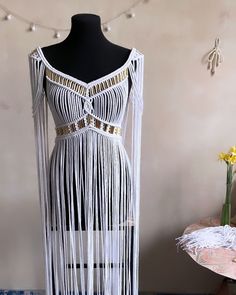 High-Quality Macramé Dress - Perfect for Weddings, Parties & Beach Getaways Step into elegance with our handcrafted macramé dress, designed for those special occasions when you want to stand out. Whether it's a dreamy wedding, a chic party, or a breezy day by the beach, this dress is your go-to for effortless style. 🌿✨ * Material: Premium quality macramé, delicately crafted for a luxurious feel. * Occasions: Ideal for weddings, summer beach events, parties, or any special gathering. * Custom Si White Beaded Bohemian Dress, Natural Wedding Dress, Nature Wedding Dress, Macrame Clothes, Beach Events, Macrame Dress, Macrame Wall Decor, Chic Party, Natural Wedding