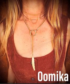 "Trendy Long Doubble Strand Leather and Goldfield Necklace with Circle Pendant and Available with Leaf of bar rod element, Statement Women Jewelry A fashionable necklace that will definitely become your favorite one. This necklace features double-strand - one suede leather and one delicate snake goldfilled chain. In its edges, it has a circle pendant and a bar rod or a feather element that threaded into the circle. Both circle and other elements are made of 14k goldfilled. you can choose your pr Festival Lariat Necklace In Metal, Festival Lariat Necklace With Adjustable Chain, Festival Metal Lariat Necklace, Adjustable Bohemian Lariat Necklace With Clavicle Chain, Lariat Choker With Clavicle Chain, Lariat Clavicle Chain Choker, Clavicle Chain Lariat Choker, Adjustable Bohemian Lariat Necklace With Delicate Chain, Resizable Gold Necklace For Festivals