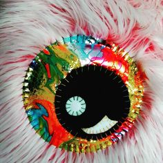 an eyeball with colorful designs on it