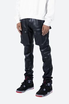 the Leather Snap Cargo Pants are designed with a fit that is relaxed throughout the leg, with cargo pockets located on the front thigh, and finishing off in our custom developed poly-leather fabric. details relaxed fit 100% polyester model is 6’1, 140 lbs and wears a size 30 Urban Pants With Multiple Pockets For Urban Adventures, Faux Leather Pants For Streetwear, Faux Leather Cargo Pants For Fall Streetwear, Fitted Faux Leather Pants For Streetwear, Casual Faux Leather Cargo Pants With Belt Loops, Casual Leather Pants With Cargo Pockets For Fall, Leather Cargo Pants With Utility Style, Utility Pants With Side Pockets For Urban Adventures, Utility Style Faux Leather Bottoms With Pockets