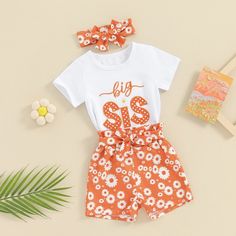 Please note that each outfit is sold separately. Little Sis Set Includes: Onesie, Shorts, & BowBig Sis Set Includes: T-shirt, Shorts, & Bow Material: Cotton Blend Gender: Girls Pattern: Letters, Floral Sleeve Length: Short Summary: Baby Toddler Short Sleeve White Orange Little Sis Onesie or Big Sis T-shirt with Matching Floral Shorts & Bow 3 Piece Outfit Set Matching Sister Sibling Outfits White Short Sleeve Sets For Spring, White Short Sleeve Spring Sets, Cute Printed Cotton Set, White Matching Set Top For Spring, Cute Letter Print Summer Sets, Orange Printed Cotton Set, White Printed Casual Sets, Matching Cotton Sets With Letter Print, Spring Cotton Sets With Letter Print